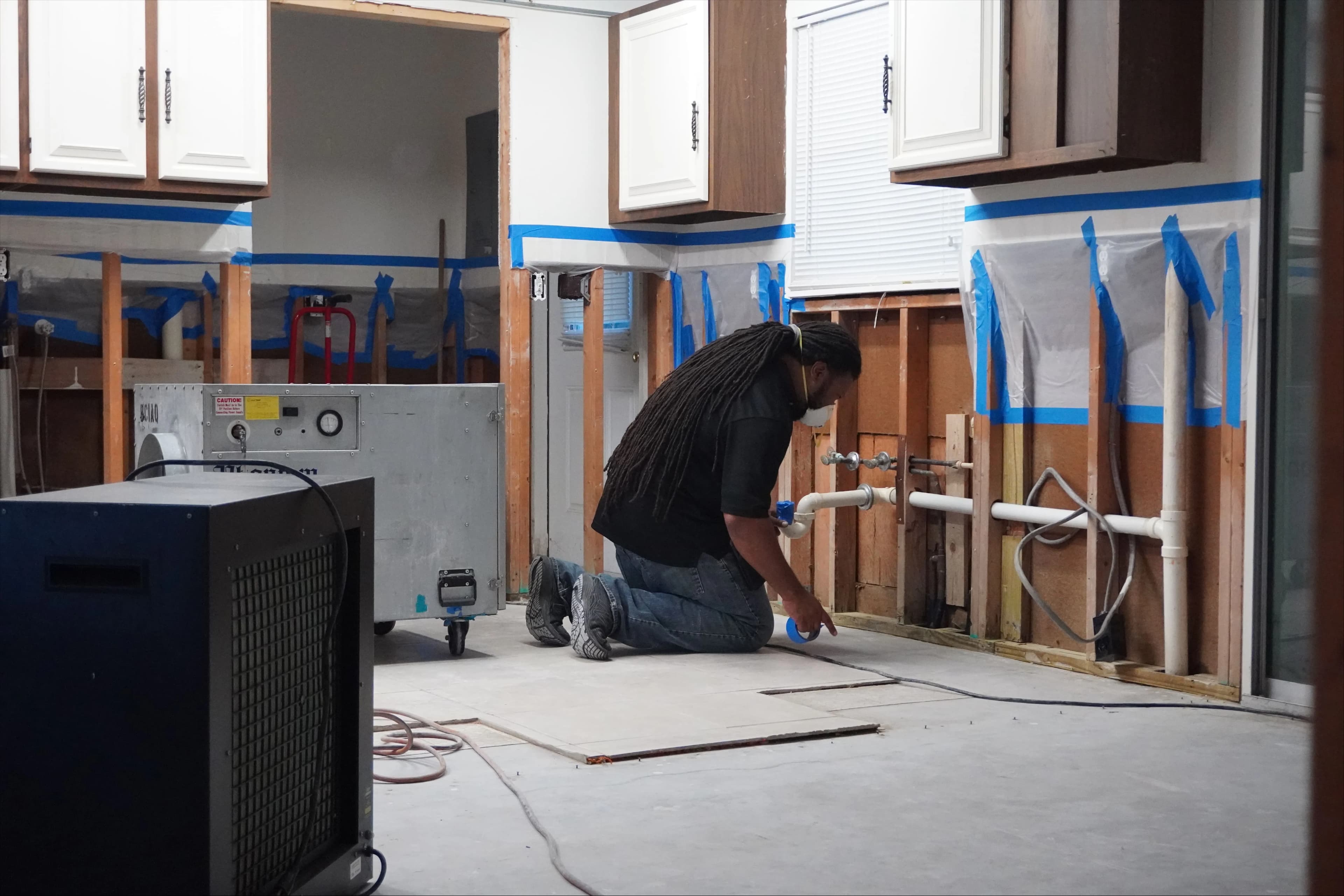 Bold City IAQ technician working during restoration job.